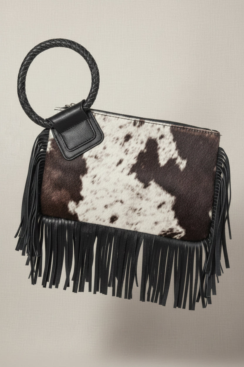 Cow print wristlet